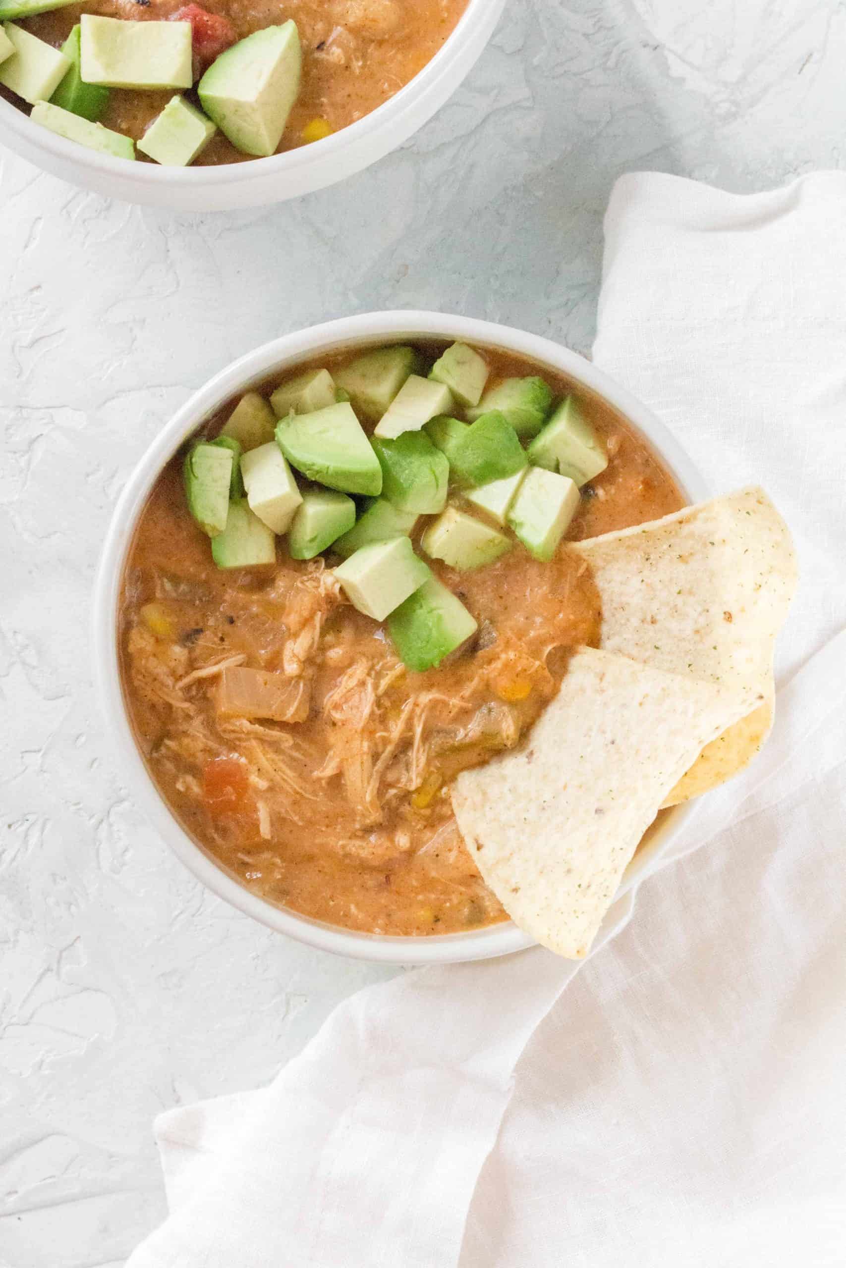 Full of flavour and is practically comfort in a bowl, you're going to love this one pot Chicken Enchilada Soup!