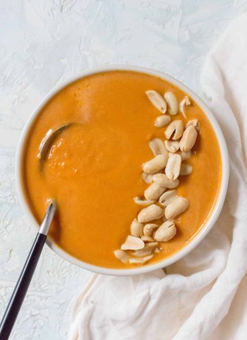 Creamy, smooth, and incredible cozy, this Slow Cooker Sweet Potato Soup with Peanut Butter, is the easiest thing you'll ever make!