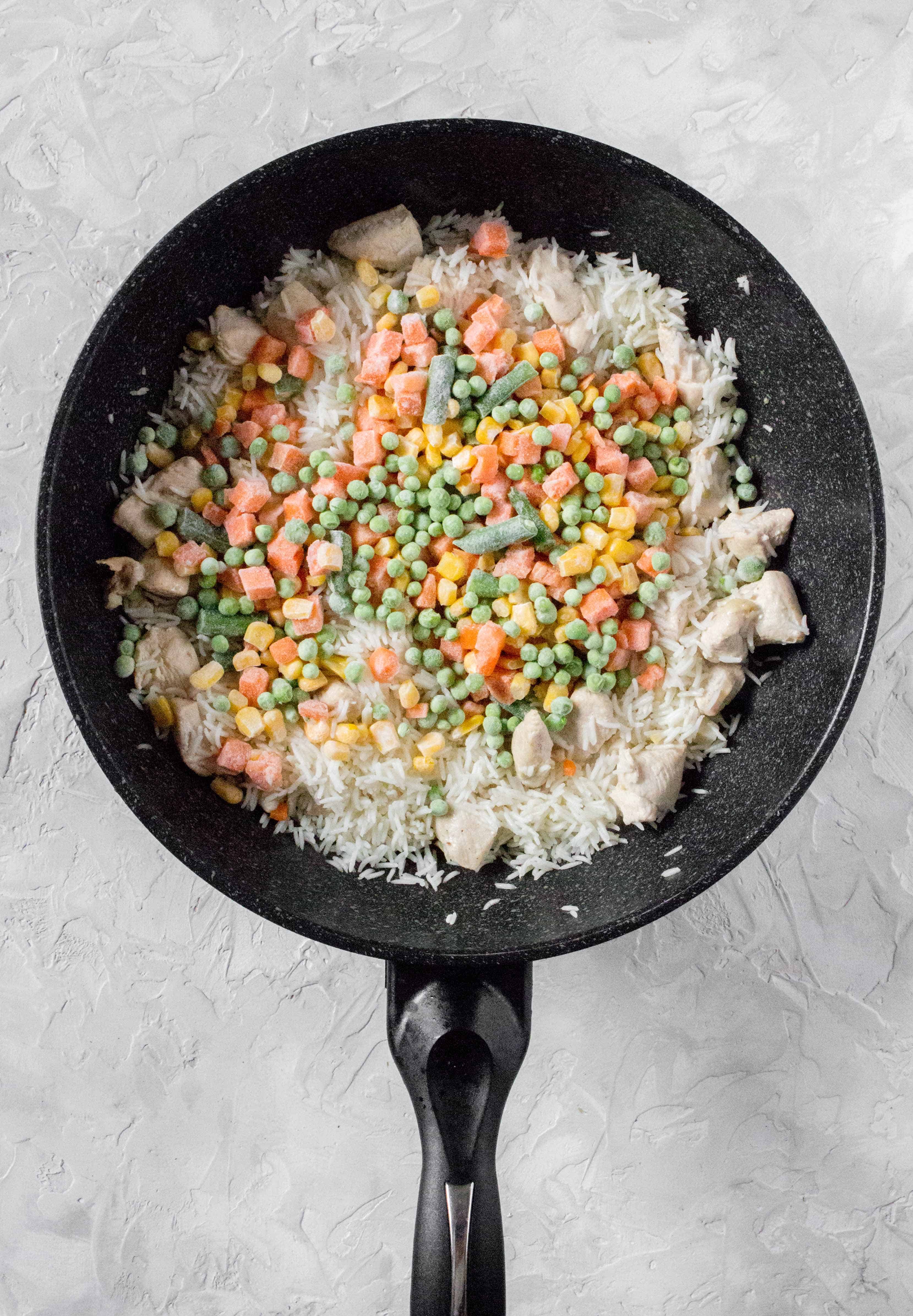 How To Make Teriyaki Chicken Bowls | add in the frozen vegetables. Place the lid back on and let it steam for 5 minutes.