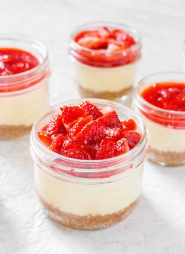 These little Instant Pot Mason Jar Cheesecakes are the perfect dessert! Great as a holiday gift or just as a way to pack yourself an individual serving of cheesecake to work!