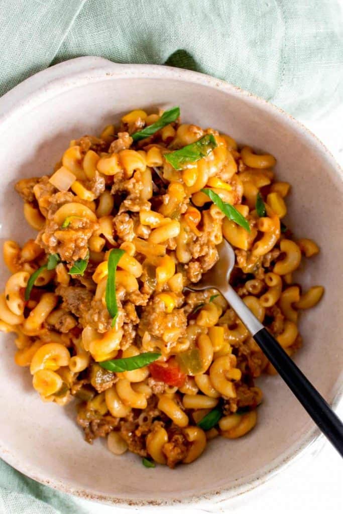 close up of one pot cheesy beef pasta in bowl