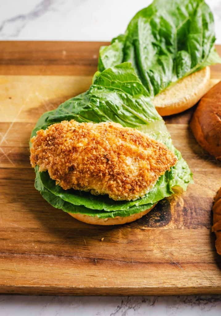 Crispy chicken breasts added to the sandwich.