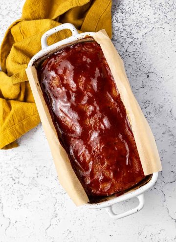 Baked chicken meatloaf in a baking dish.