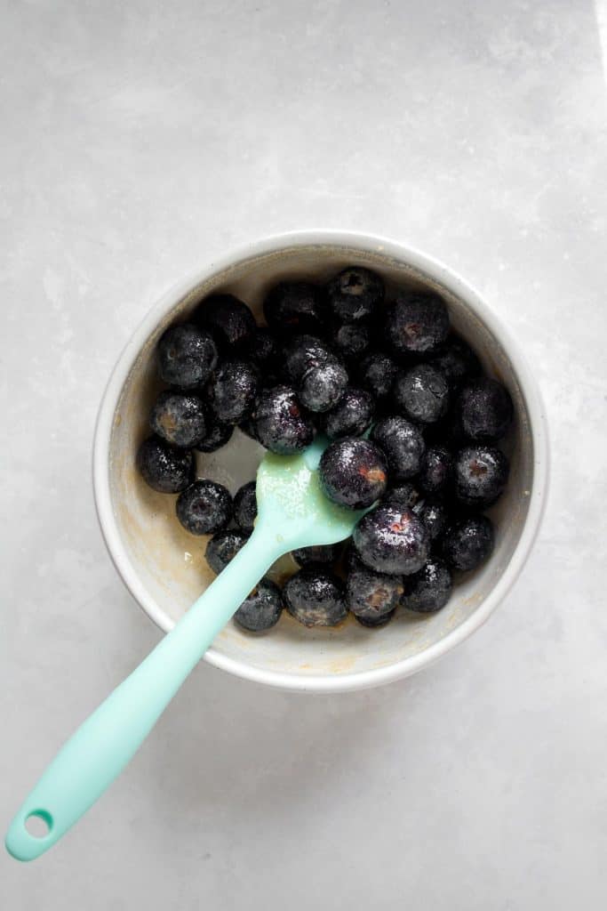 Blueberries mixed with lemon juice and brown sugar.