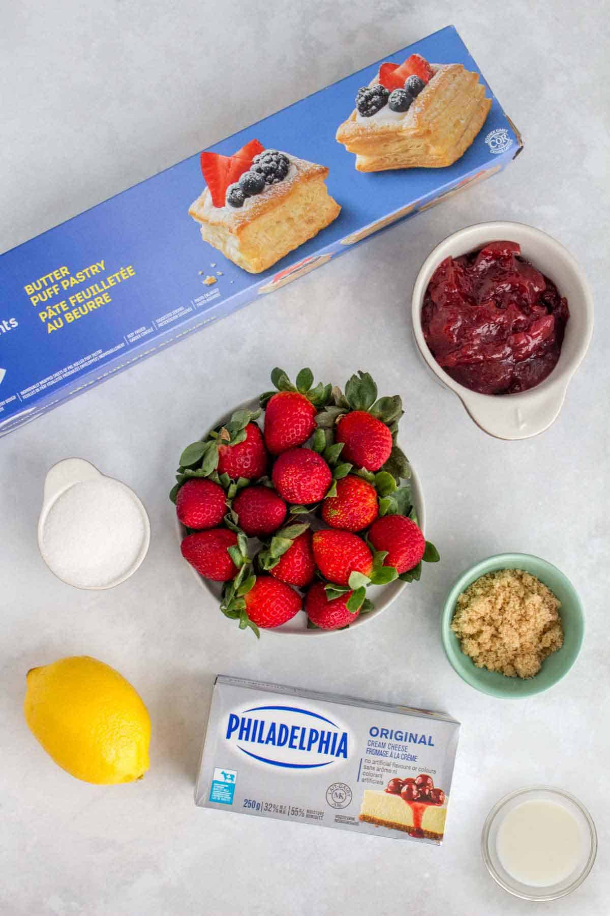 Ingredients needed to make a strawberry danish.
