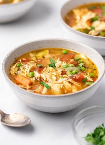 A bowl of instant pot chicken vegetable soup.