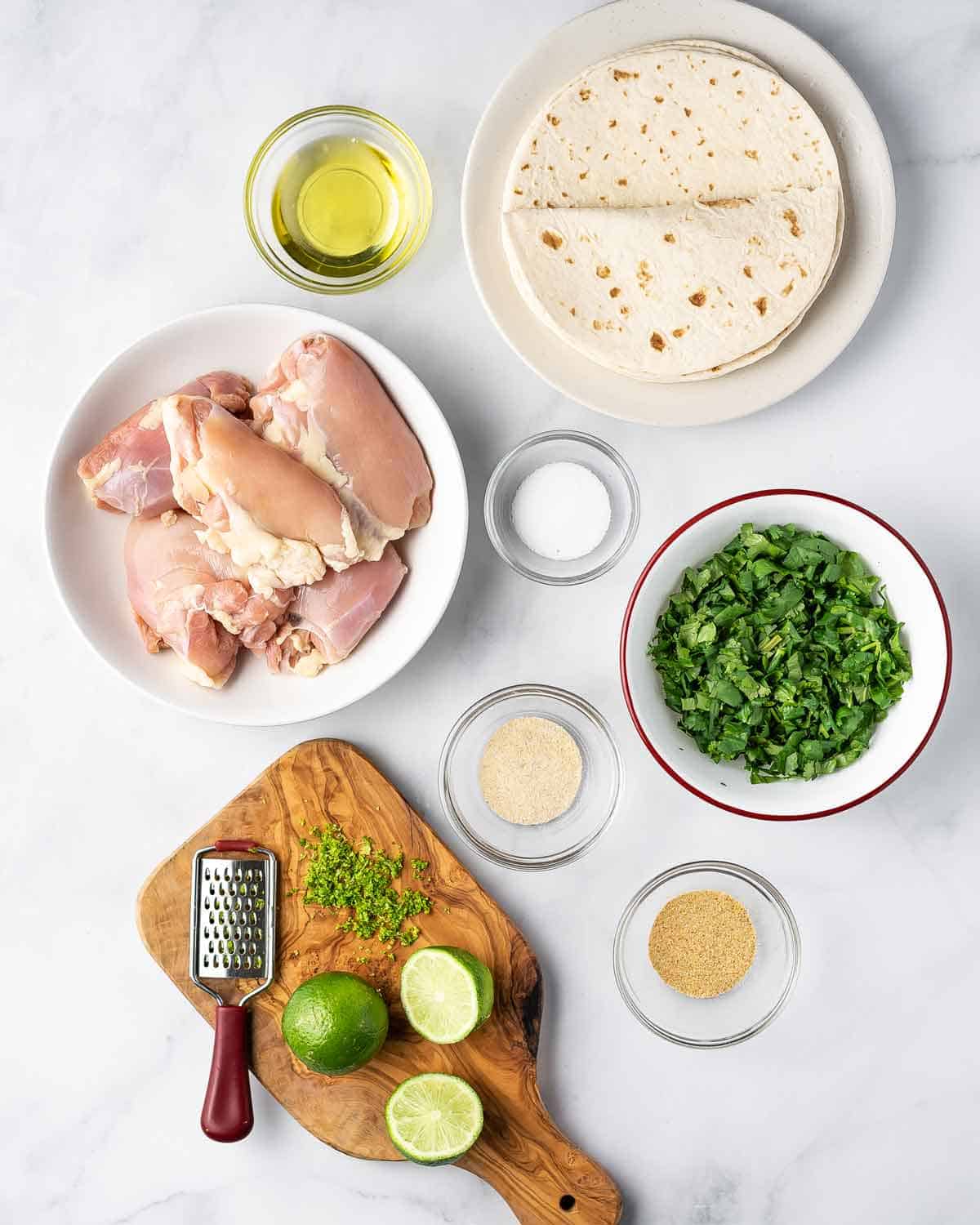 Ingredients needed to make cilantro lime chicken tacos.