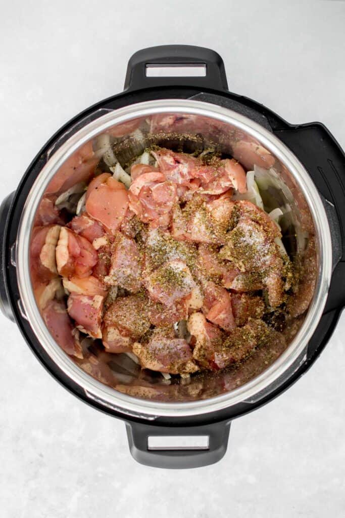 Seasoned chicken thighs in the Instant Pot.