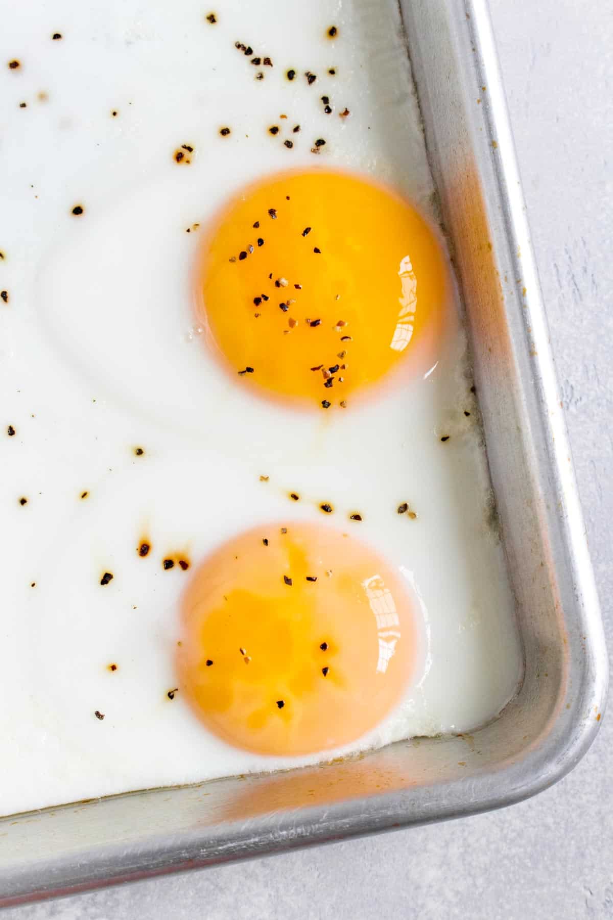 Close up of two egg yolks.