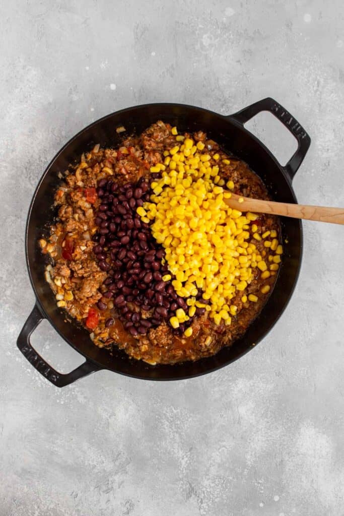 Black beans and corn added to beef.
