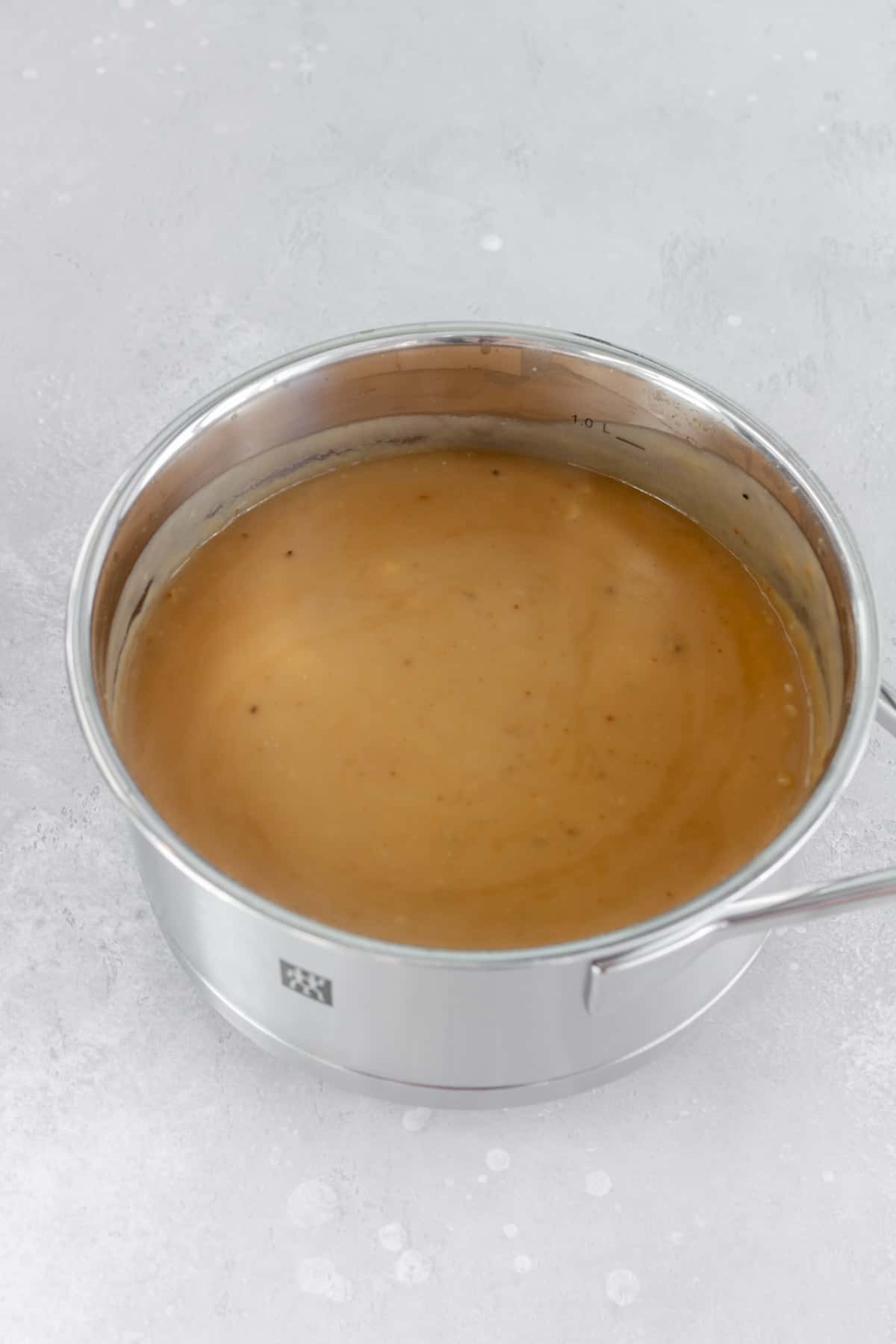 A pot of brown gravy made without drippings.