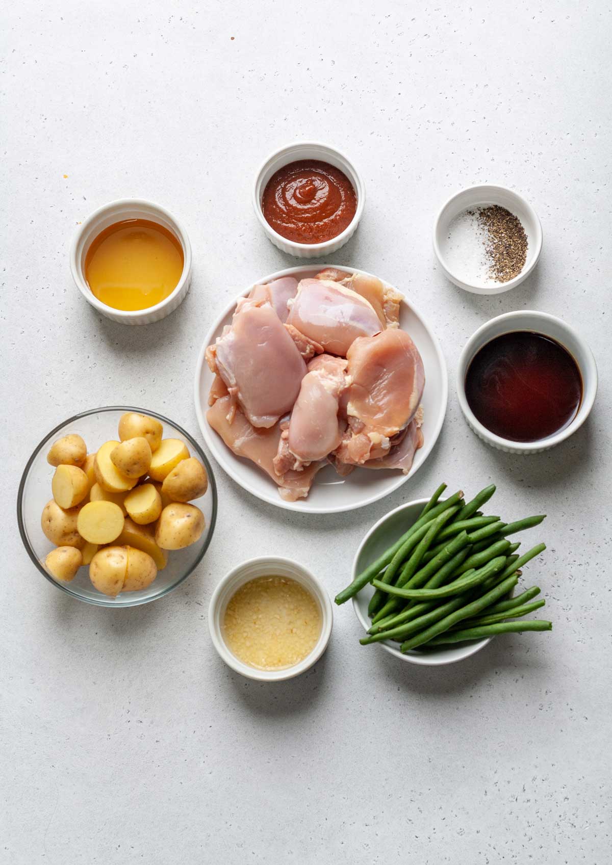 Ingredients needed to make slow cooker chicken potatoes and green beans.