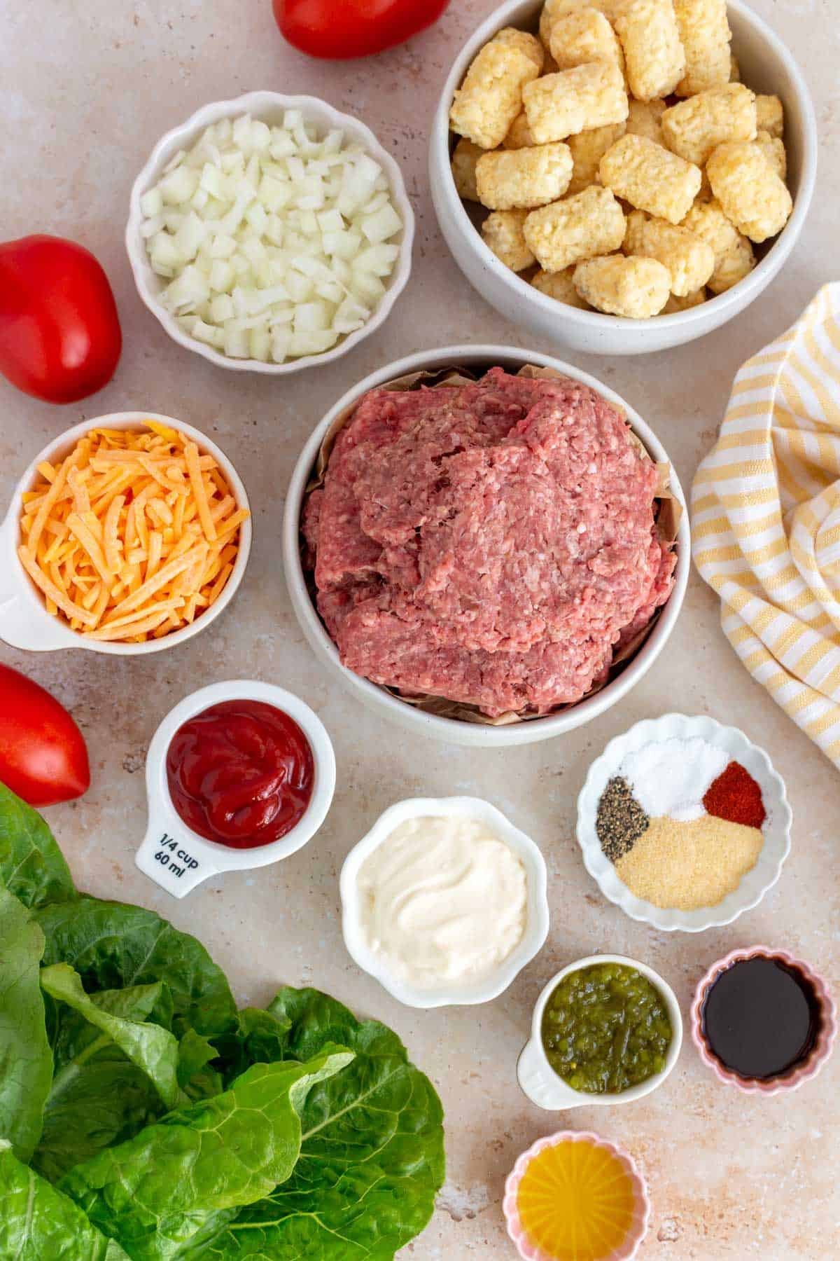 Ingredients needed to make a big mac casserole with tater tots.