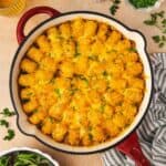 Overhead view of sloppy joe tater tot casserole in a large skillet.