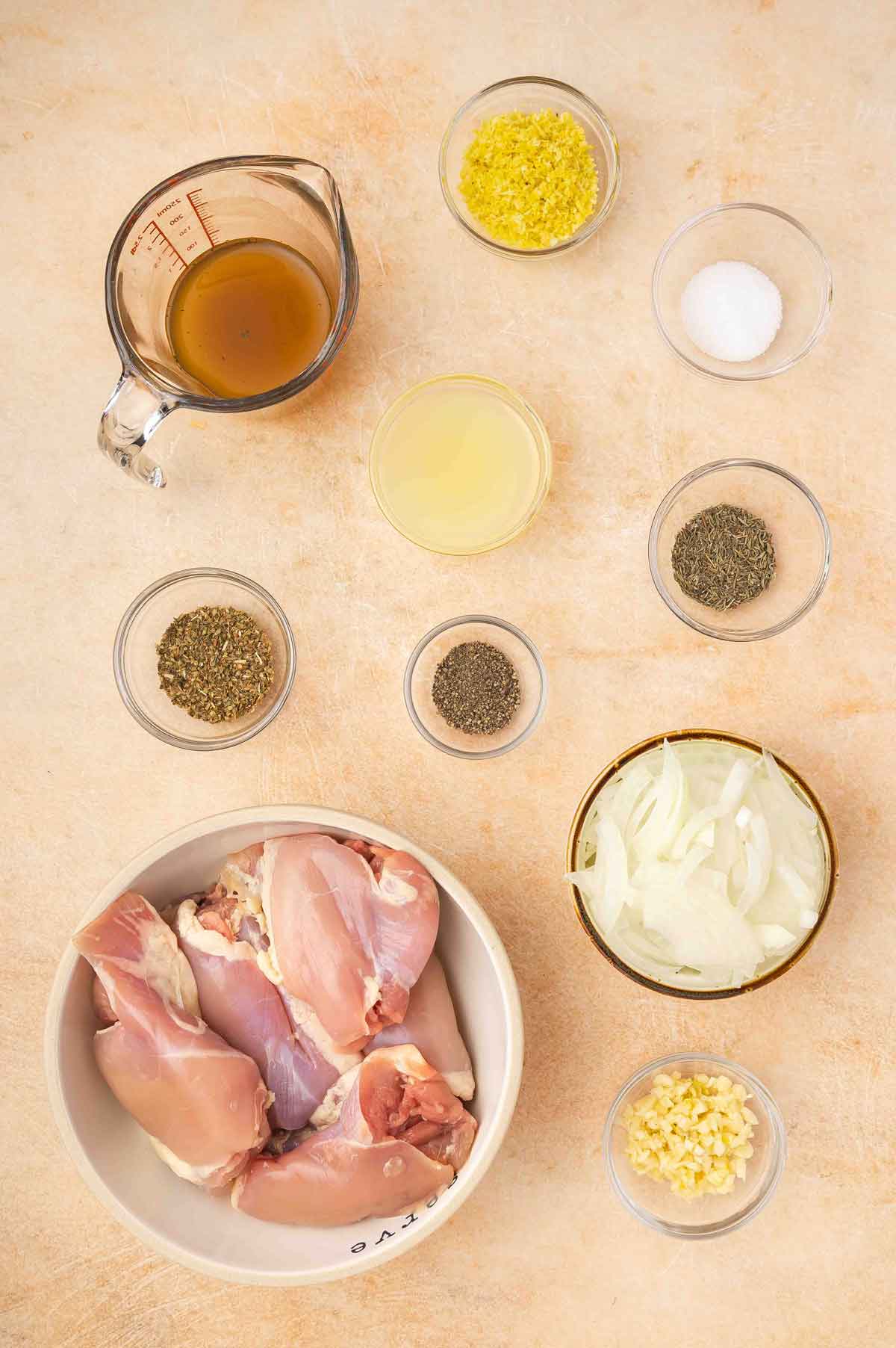 Ingredients needed to make slow cooker Greek chicken.